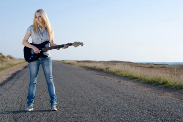Beautiful blonde with a guitar Beautiful blonde with a guitar