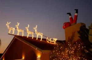 Santa stuck in chimney decoration - David McNew/Getty Images Santa stuck in chimney decoration